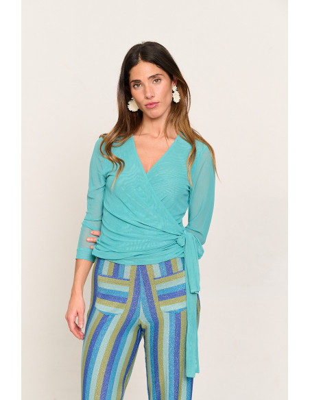 Chaqueta cruzada turquesa de tul con lazada BMB & Co. vista frontal