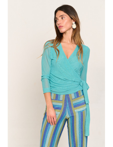 Chaqueta cruzada turquesa de tul con lazada BMB & Co. vista front